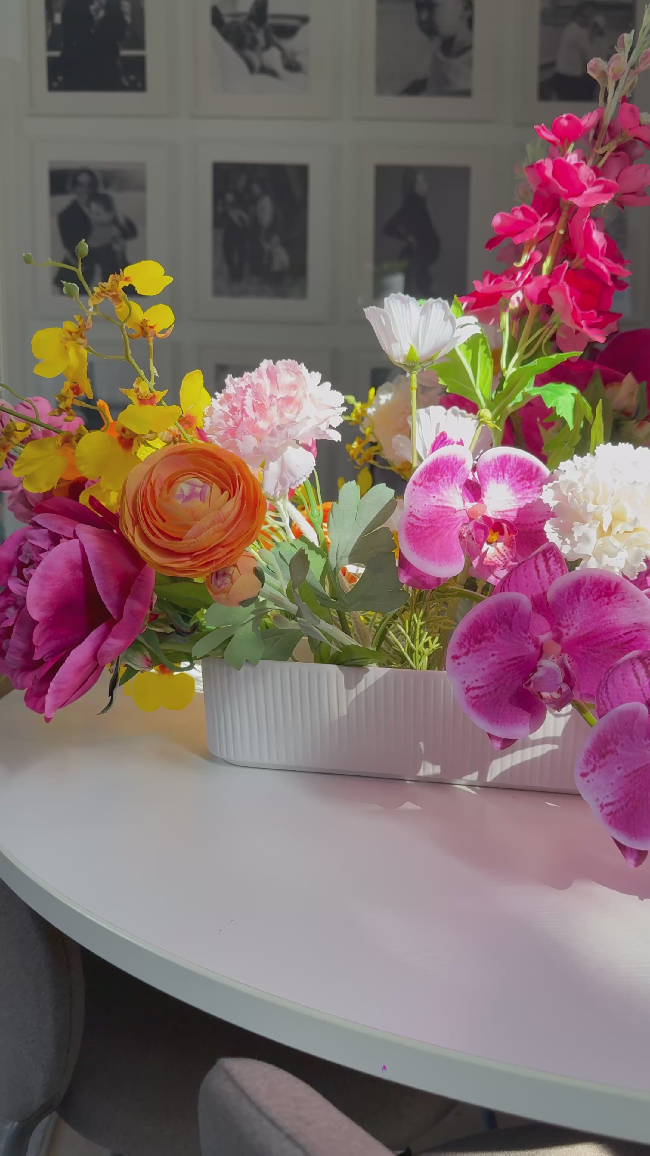 Luxury faux floral centerpiece in rectangular white ceramic pot with colourful blooms – perfect for table styling or home decor.