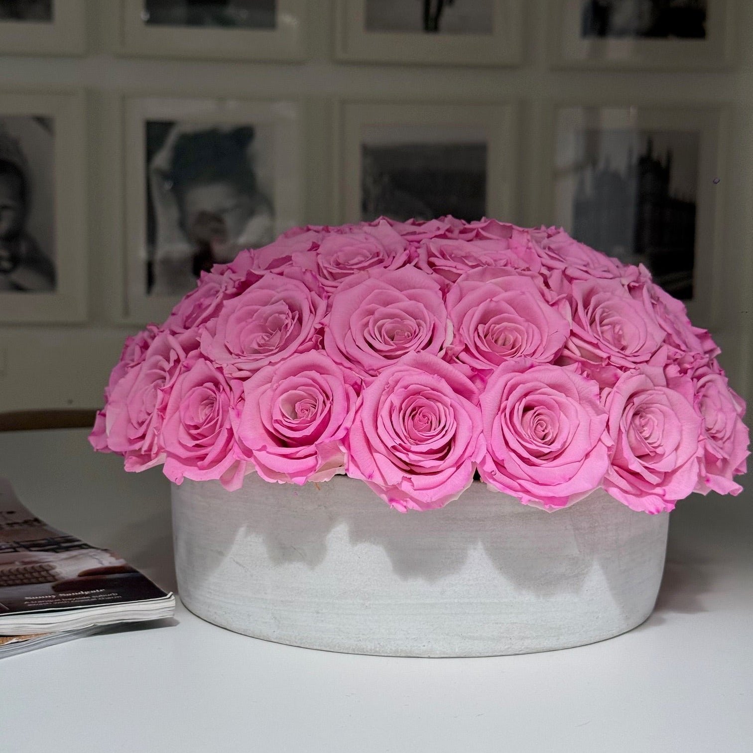 Fleur du Luxe preserved roses styled with home décor on dining table.