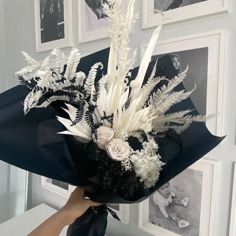 Black and white roses preserved to last a year